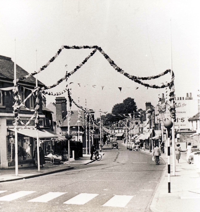 Ewell High Street decorated for Elizabeth II coronation. Ewell High Street decorated for Elizabeth II coronation.