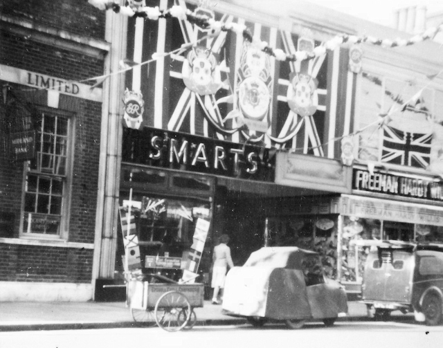 Epsom High Street, Shop fronts of Smarts and Freeman Hardy and Willis decorated for Coronation Epsom High Street, Shop fronts of Smarts and Freeman Hardy and Willis decorated for Coronation