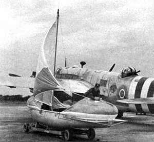 A rigged Airborne Lifeboat in front of the Vickers Warwick B.1, BV351, sometime after June 6th, 1944