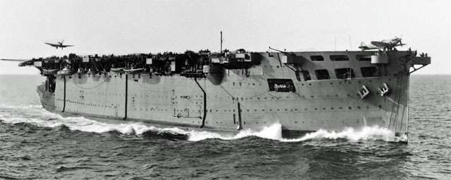 HMS Argus in action (during Operation Torch) off North Africa in November 1942. HMS Argus in action (during Operation Torch) off North Africa in November 1942.