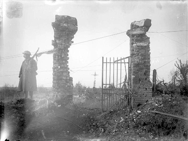 Ruined gateway at the entrance to the churchyard in Bouzincourt Ruined gateway at the entrance to the churchyard in Bouzincourt