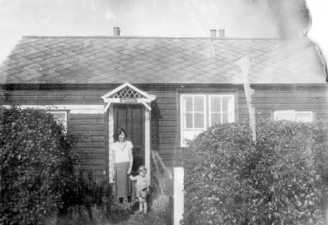 Georgina and Maurice at the front door of Southcot, Plough Road, West Ewell