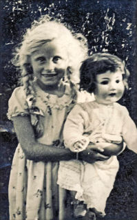 Margaret Swan and her doll on 18th August 1948