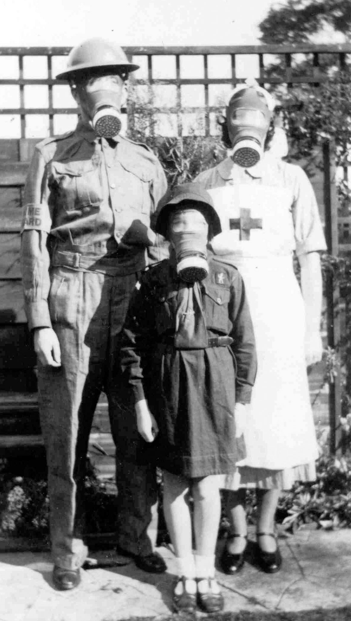 Family Wearing Gas Masks Family Wearing Gas Masks
