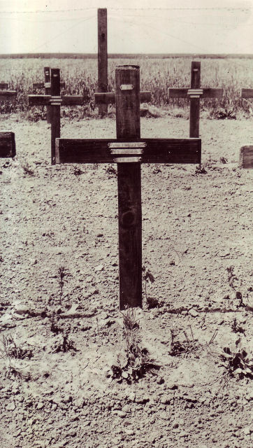 Adam's original grave marker at plot E.4. at Brebières British Cemetery. Adam's original grave marker at plot E.4. at Brebières British Cemetery.