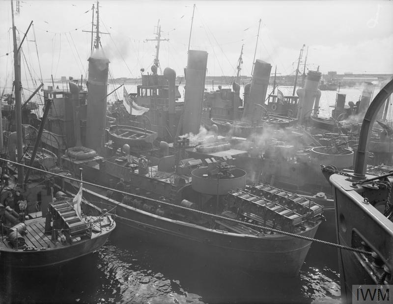 Trawlers and drifters at their moorings at Scapa, April 1942.