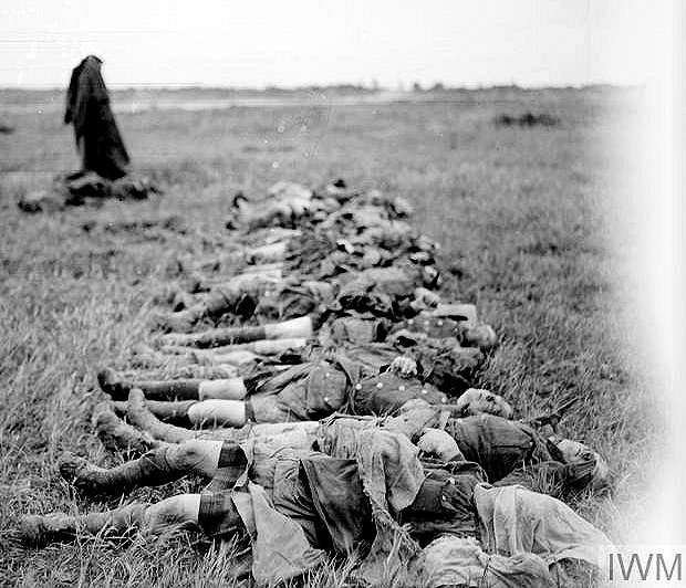 Dead soldiers of one of the Highlanders regiments awaiting burial, August 1917.