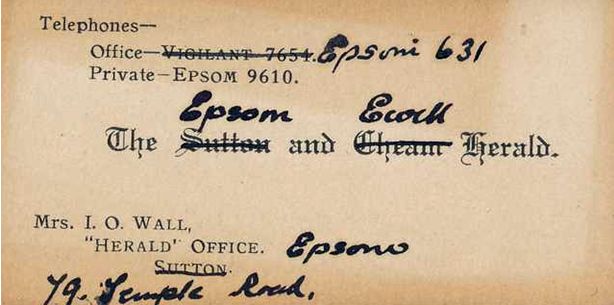 One of Iris's journalistic business cards