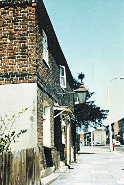 The sweep's brush outside Tester & Tuck (33/7 East Street)