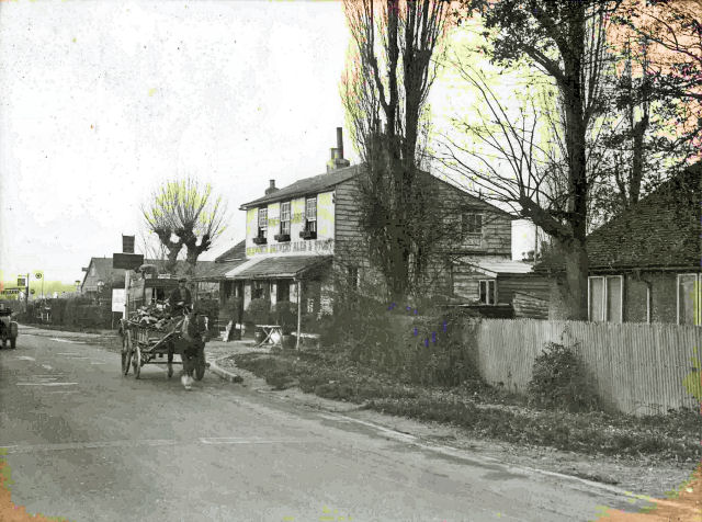 The Queen Adelaide was for many years a cow-keeper's cottage and inn with a verandah by the roadside, until rebuilt for motor trade in 1932 by Watney Combe Reid. 