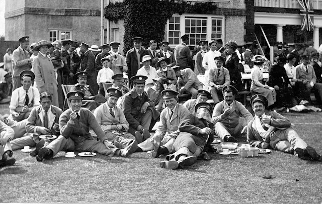 Postcard view of patients relaxing outside Horton (County of London) War Hospital