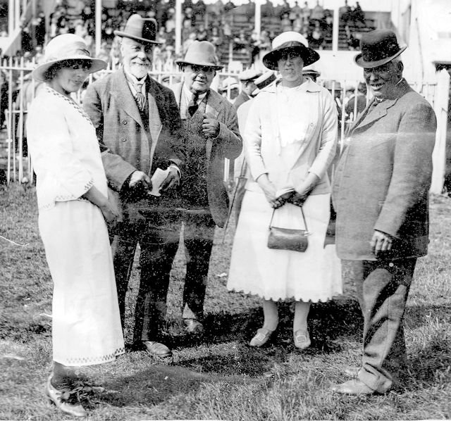 George Oakshott (right) at the Derby with some unidentified people