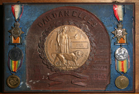 The Randall brothers medals with Sidney's bronze plaque in a wooden frame The Randall brothers medals with Sidney's bronze plaque in a wooden frame.