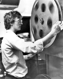 Iain demonstrates the best way to rip apart your thumb and forefinger whilst rewinding a film in 1982.