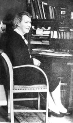 Mrs Long, Manager, in her office