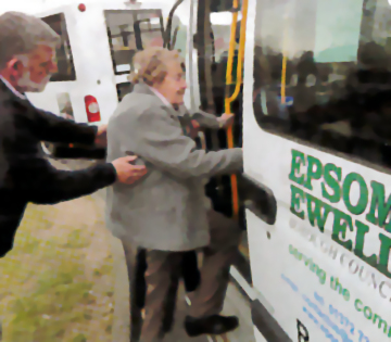 Member of the Routecall Team Assisting a Passenger