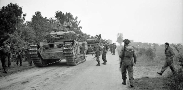 Infantrymen of the 2nd Battalion, Glasgow Highlanders, with Churchill tanks Infantrymen of the 2nd Battalion, Glasgow Highlanders, with Churchill tanks