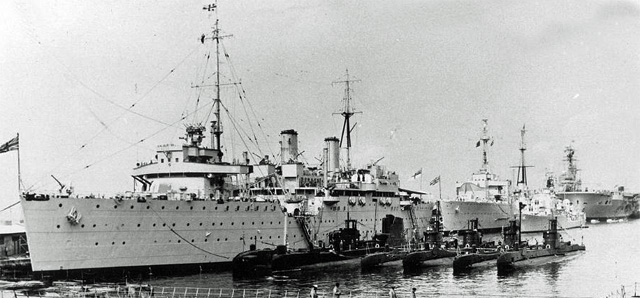 HMS Medway, in port with submarines alongside HMS Medway, in port with submarines alongside